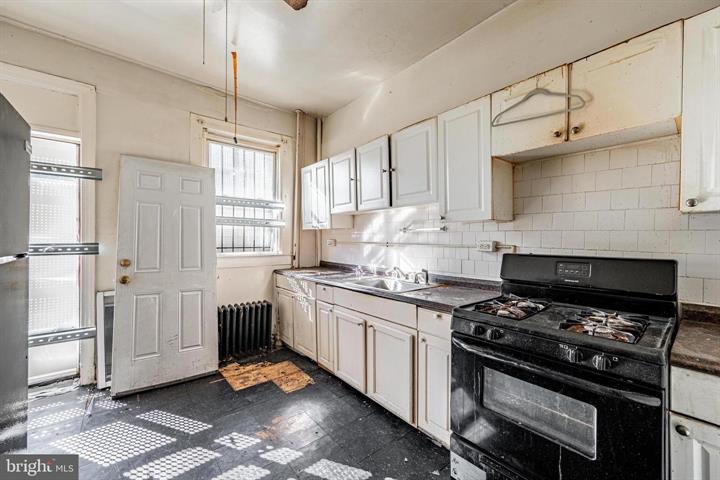 Classic Baltimore Rowhome Ready for Full Transformation
