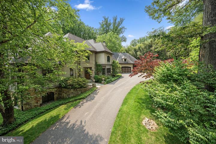 Timeless Elegance in Bethesda’s Prestigious Burning Tree Enclave